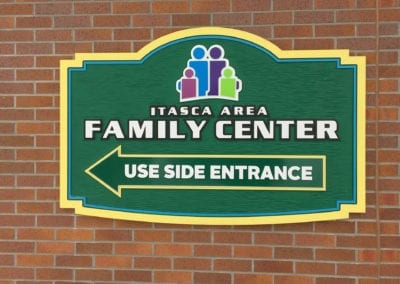 Sign on Brick Building for Itasca Area Family Center