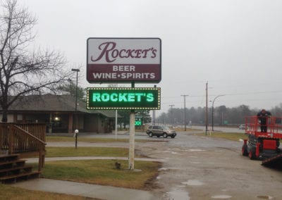 lighted sign for Rocket's Beer, Wine & Spirits.