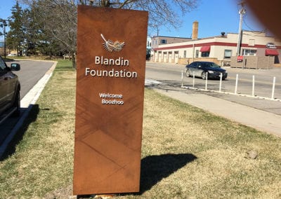 lighted sign on grassy patch for the Blandin Foundation